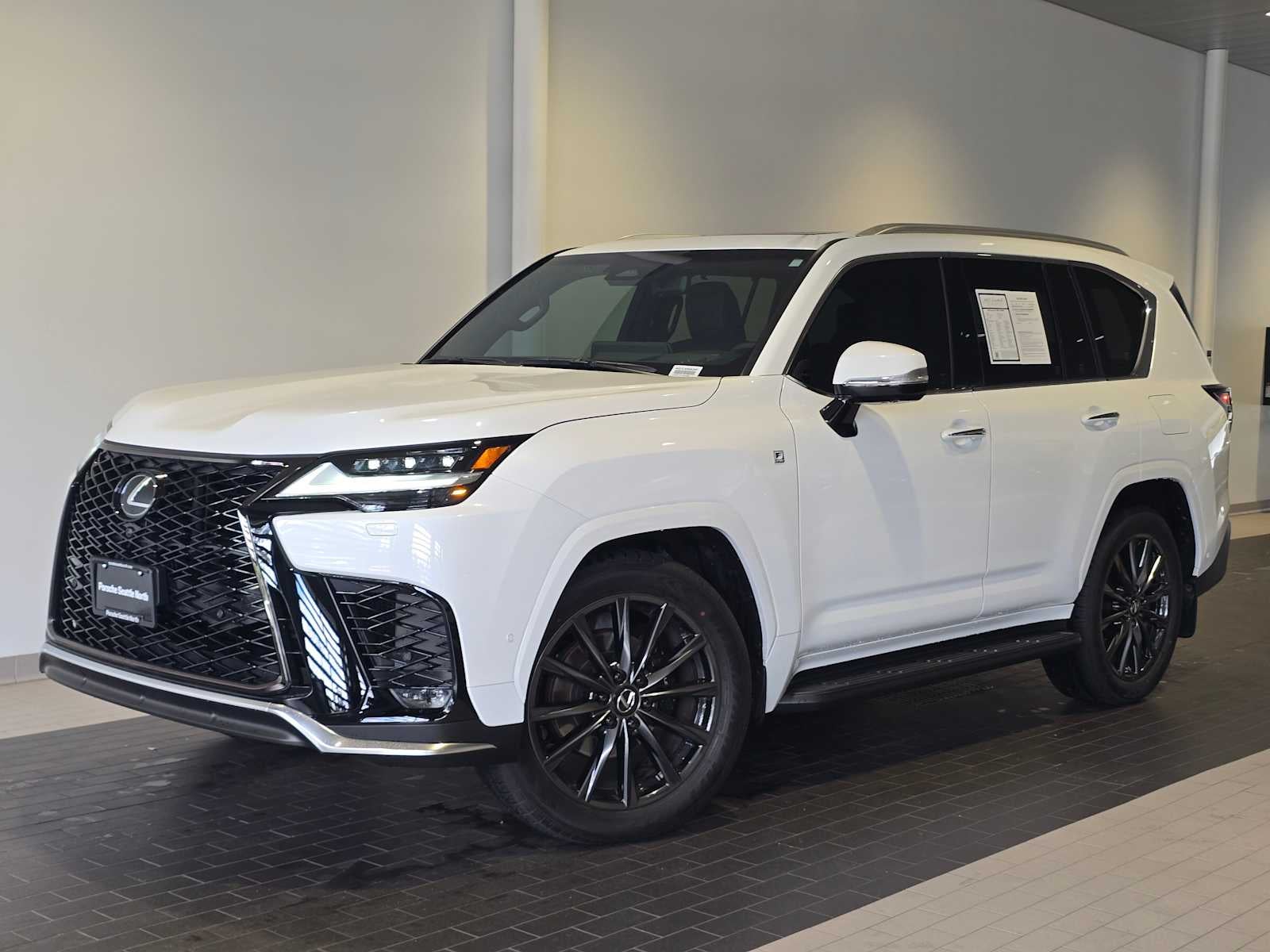 2026 Lexus LX 700h F SPORT Handling in Ultra White — front three-quarter view