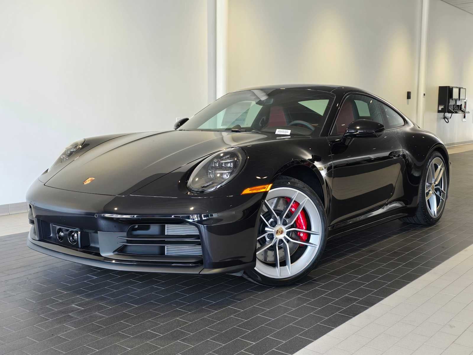 2025 Porsche 911 911 Carrera S in Jet Black Metallic — front three-quarter view