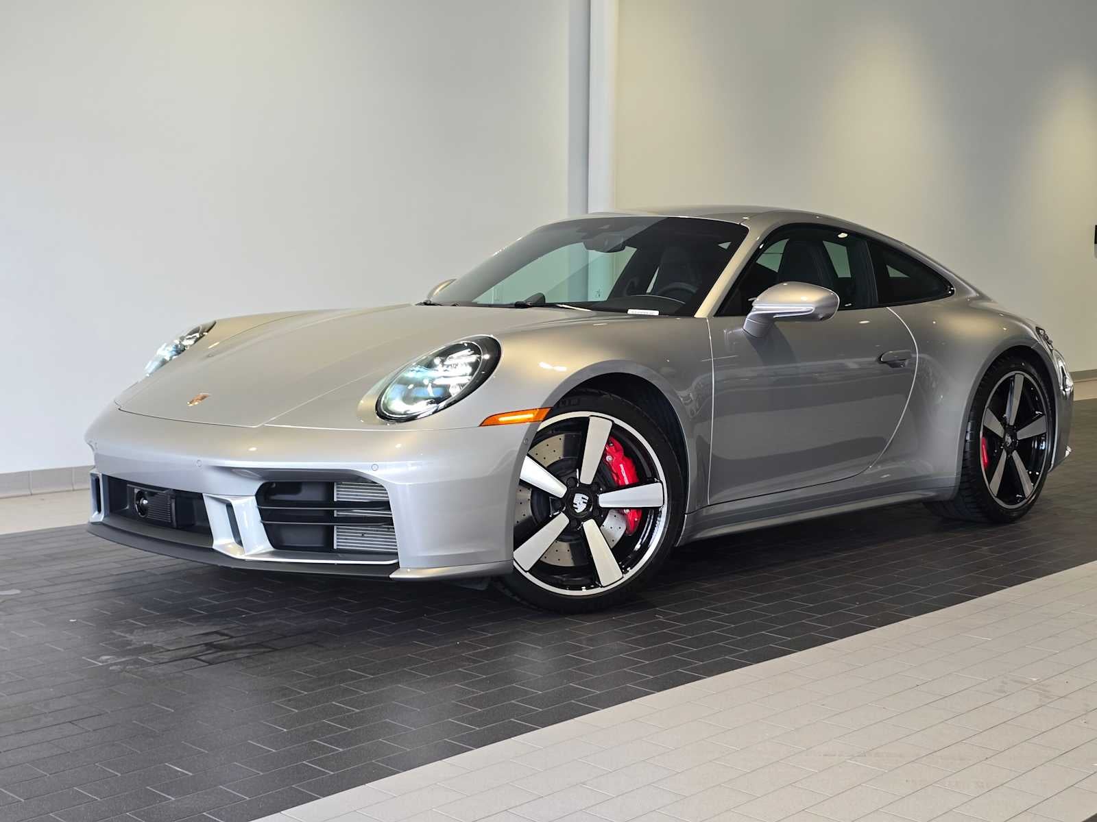 2025 Porsche 911 911 Carrera S in Gt Silver Metallic — front three-quarter view
