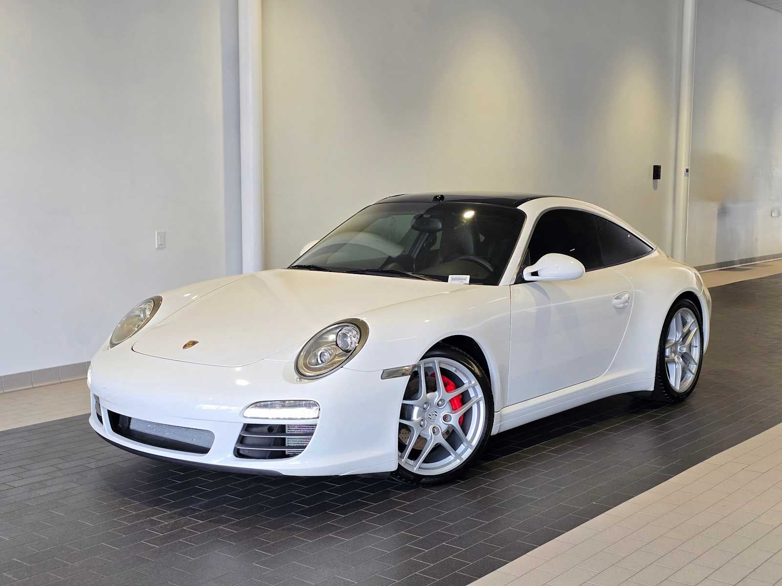 2011 Porsche 911 4S in Carrara White — front three-quarter view