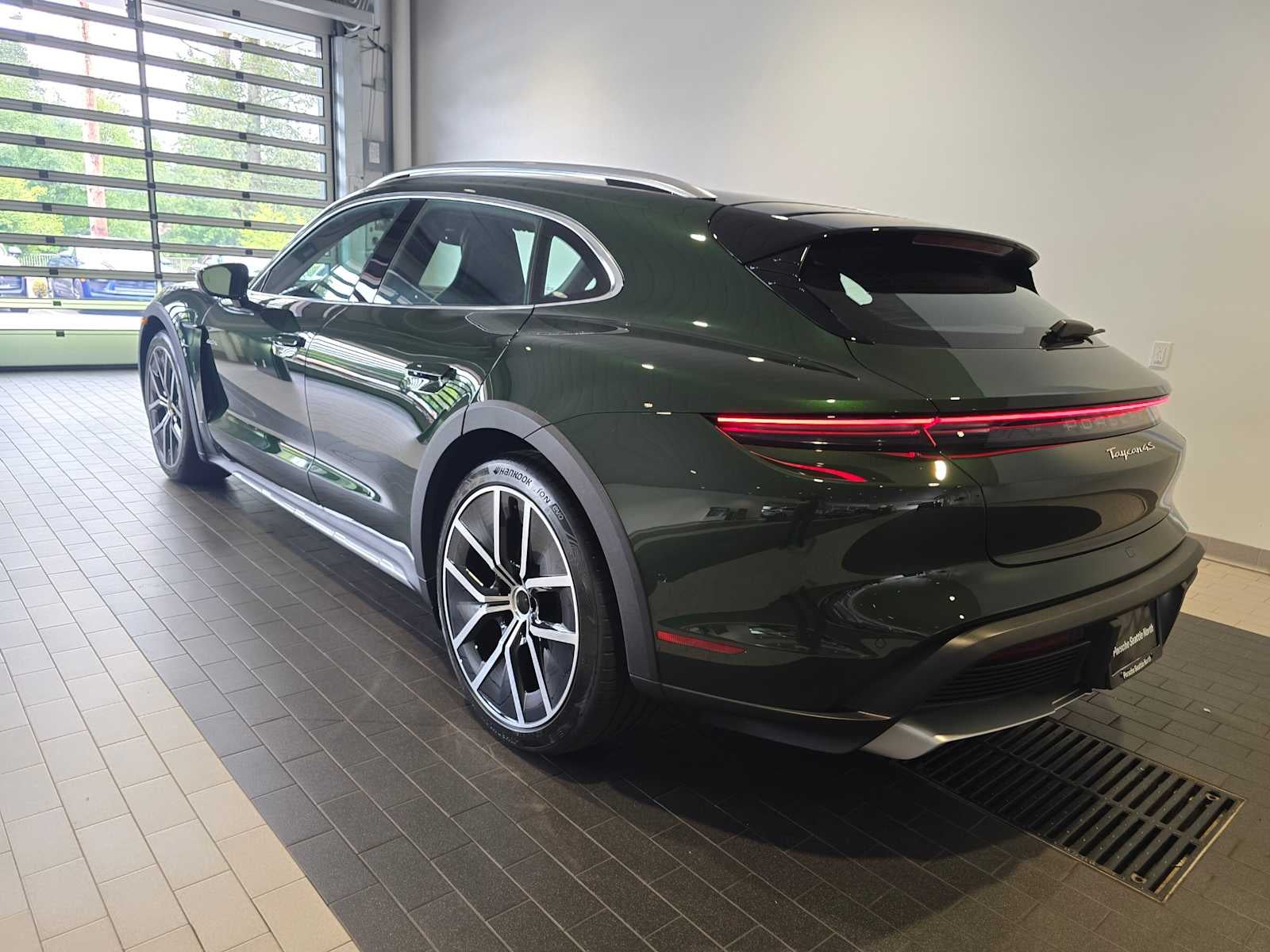 2026 Porsche Taycan — rear three-quarter view