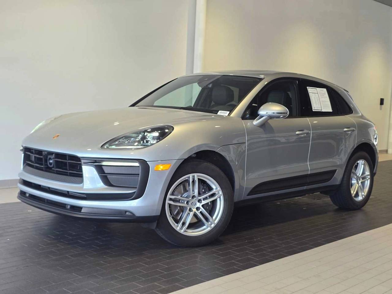 2025 Porsche Macan Macan in Dolomite Silver Metallic — front three-quarter view