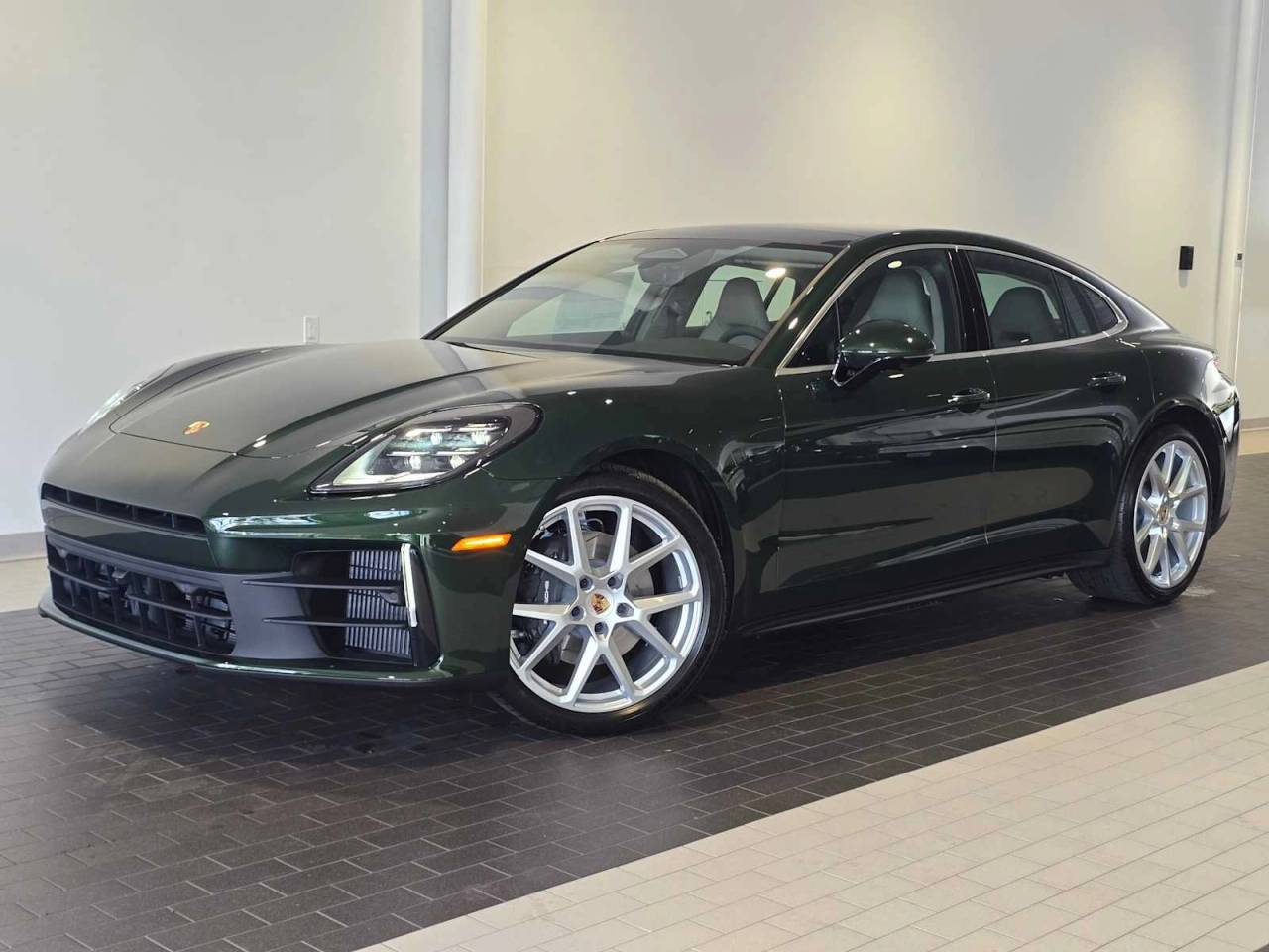 2026 Porsche Panamera Panamera 4 in Oak Green Metallic Neo — front three-quarter view