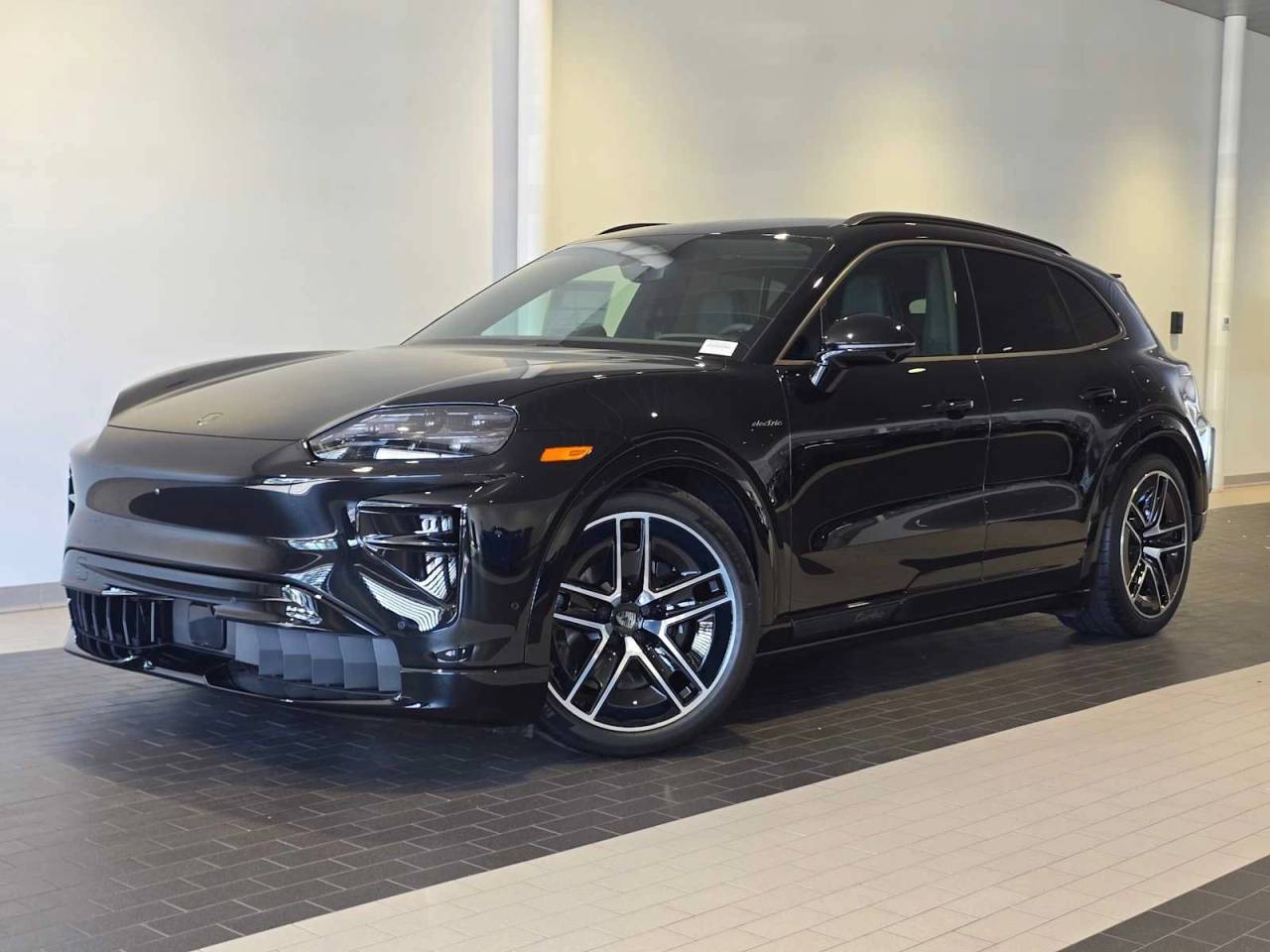 2026 Porsche Cayenne Cayenne Turbo Electric in Chromite Black Metallic — front three-quarter view